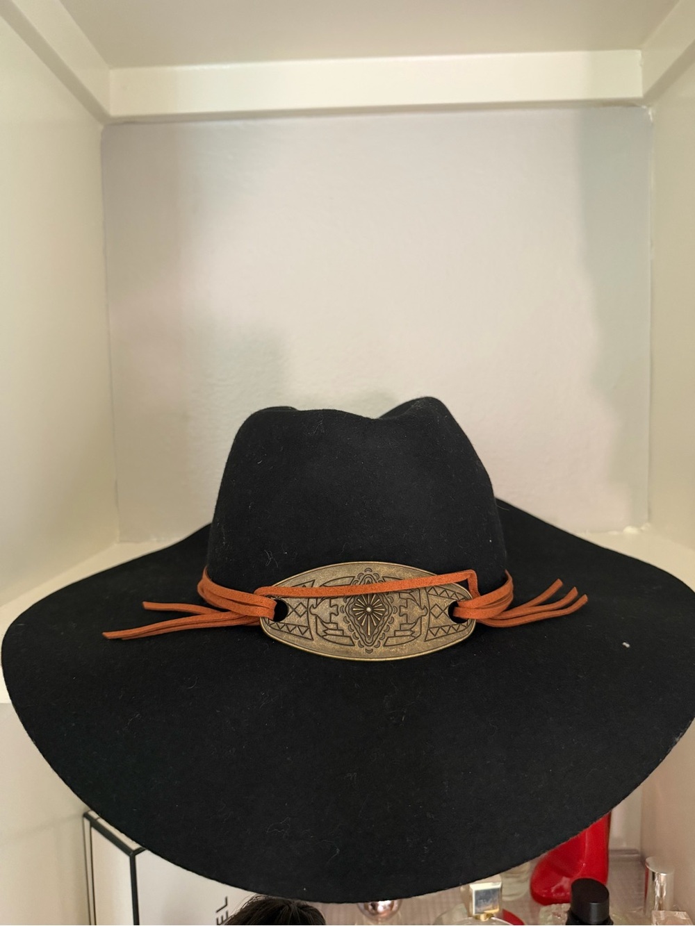 Black Western Felt Hat with Decorative Concho and Brown Leather Band